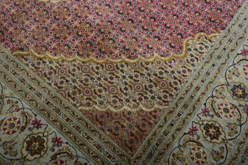 Close-up detail of New Tabriz rug from Iran / Persia showing Cork weave