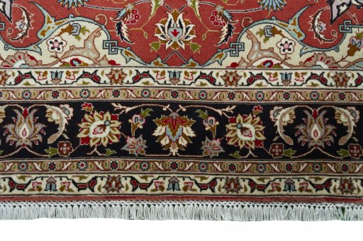 Corner detail of New Tabriz rug showing border pattern and Cork pile