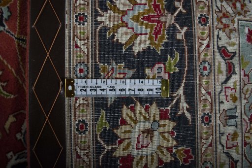 Central medallion detail of New Tabriz rug from Iran / Persia