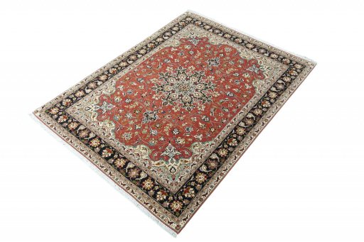 Corner detail of New Tabriz rug showing border pattern and Cork pile