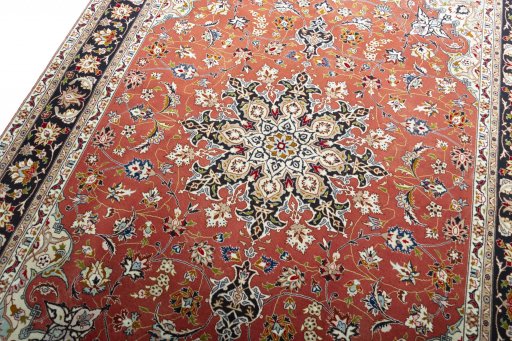 Backside of handmade New Tabriz rug showing knot structure and weave density