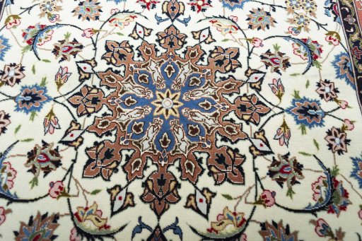 Central medallion detail of New Tabriz rug from Iran / Persia