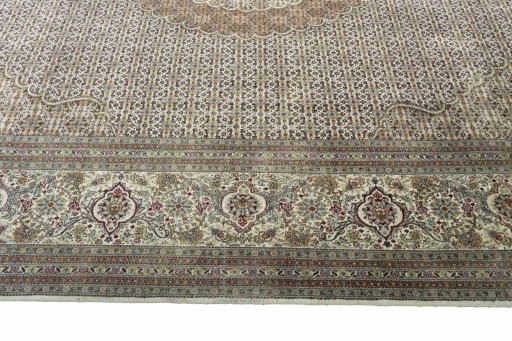 Corner detail of New Tabriz rug showing border pattern and Cork pile