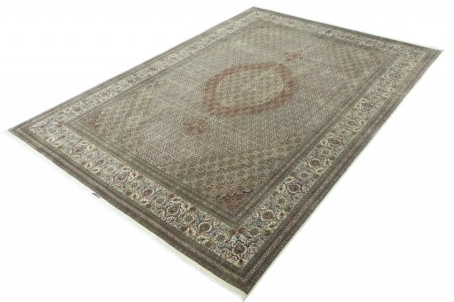 Corner detail of New Tabriz rug showing border pattern and Cork pile