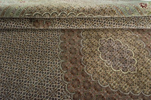 Close-up detail of 2000s Tabriz rug from Iran / Persia showing Cork weave