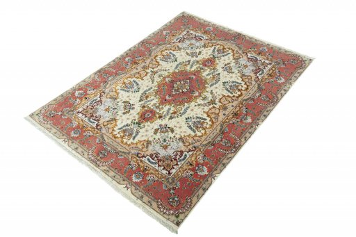 Corner detail of New Tabriz rug showing border pattern and Cork pile