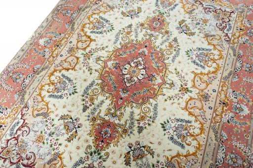 Backside of handmade New Tabriz rug showing knot structure and weave density