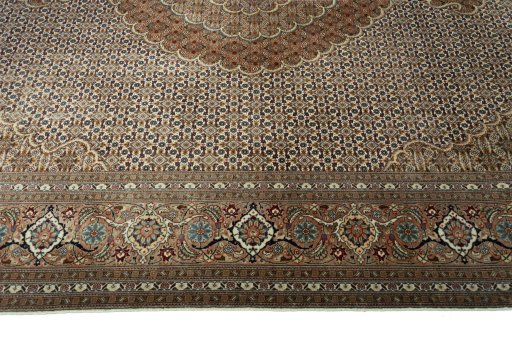 Corner detail of New Tabriz rug showing border pattern and Cork pile