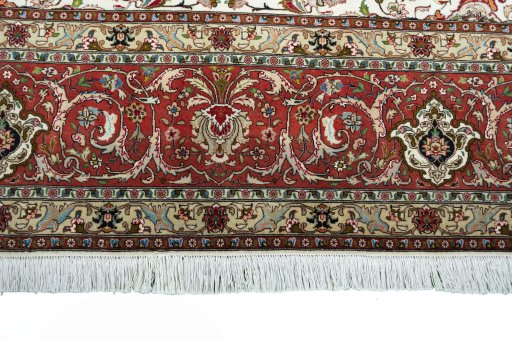 Corner detail of New Tabriz rug showing border pattern and Cork pile