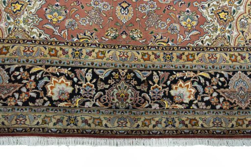 Corner detail of New Tabriz rug showing border pattern and Cork pile