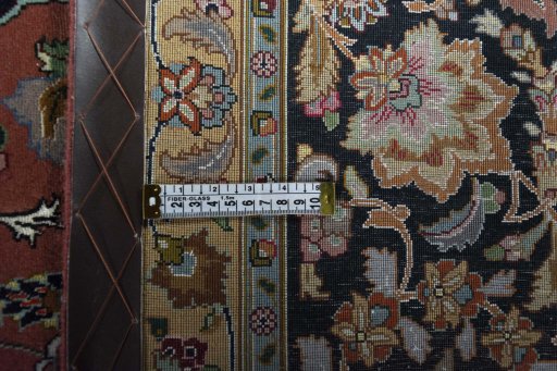 Central medallion detail of New Tabriz rug from Iran / Persia