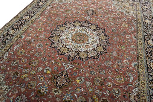 Backside of handmade New Tabriz rug showing knot structure and weave density