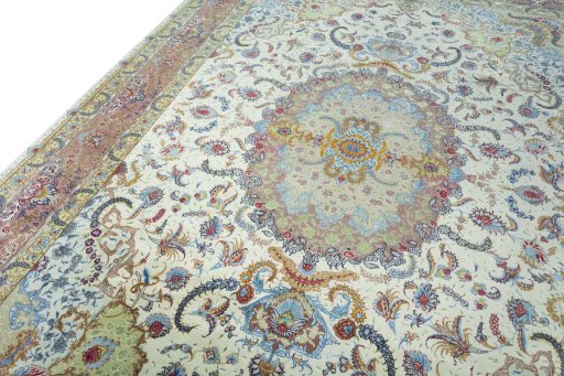 Backside of handmade New Tabriz rug showing knot structure and weave density