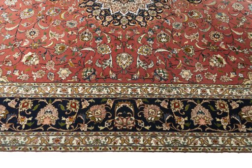Corner detail of New Tabriz rug showing border pattern and Cork pile