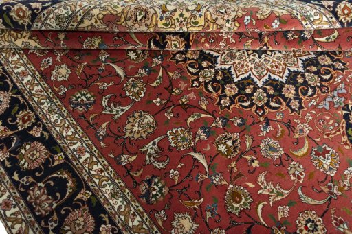 Close-up detail of New Tabriz rug from Iran / Persia showing Cork weave