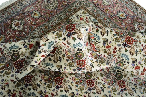 Corner detail of New Tabriz rug showing border pattern and Cork pile