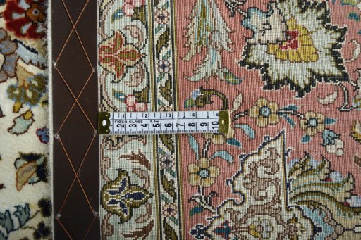 Close-up detail of New Tabriz rug from Iran / Persia showing Cork weave