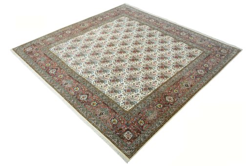 Corner detail of New Tabriz rug showing border pattern and Cork pile