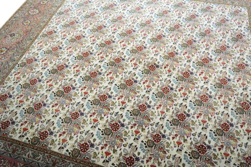 Backside of handmade New Tabriz rug showing knot structure and weave density