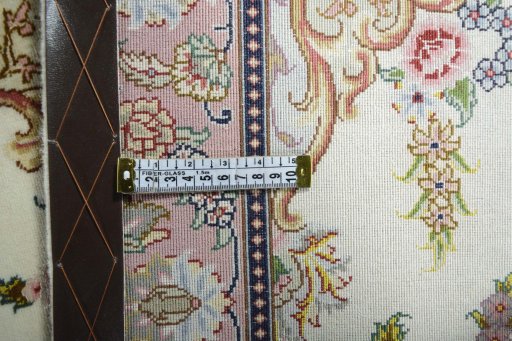 Surface texture of New Tabriz rug with natural Cork and intricate pattern