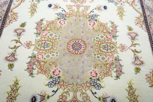 Central medallion detail of New Tabriz rug from Iran / Persia