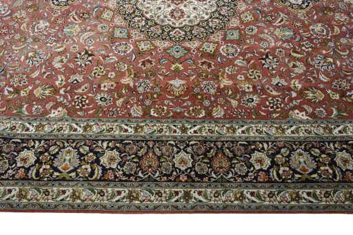 Corner detail of New Tabriz rug showing border pattern and Cork pile