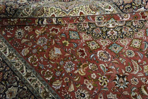 Close-up detail of New Tabriz rug from Iran / Persia showing Cork weave