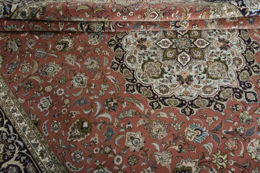 Close-up detail of New Tabriz rug from Iran / Persia showing Cork weave