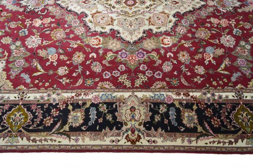 Corner detail of New Tabriz rug showing border pattern and Cork pile