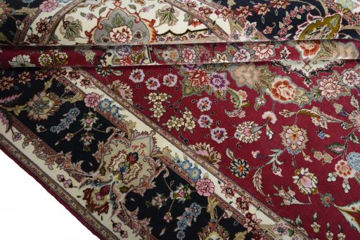 Close-up detail of New Tabriz rug from Iran / Persia showing Cork weave