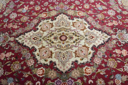 Central medallion detail of New Tabriz rug from Iran / Persia