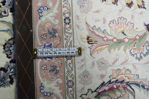Close-up detail of New Tabriz rug from Iran / Persia showing Cork weave