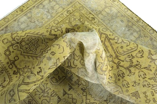 Surface texture of 1970s Tabriz rug with natural Wool and intricate pattern