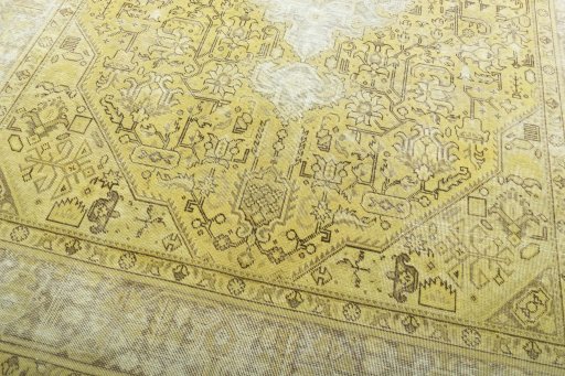 Close-up detail of 1970s Tabriz rug from Iran / Persia showing Wool weave
