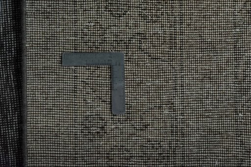Backside of handmade 1950s Tabriz rug showing knot structure and weave density