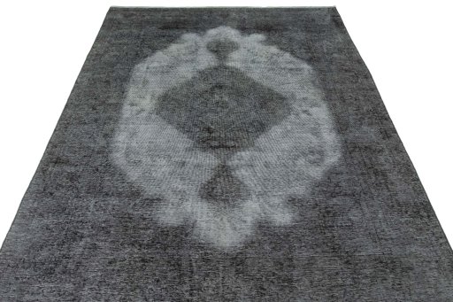 Surface texture of 1950s Tabriz rug with natural Wool and intricate pattern