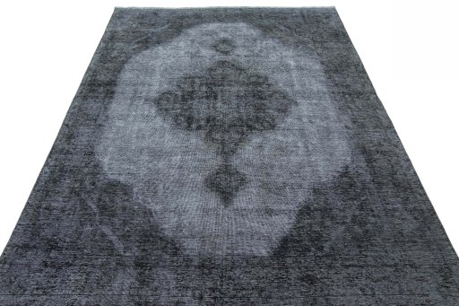 Surface texture of 1950s Tabriz rug with natural Wool and intricate pattern