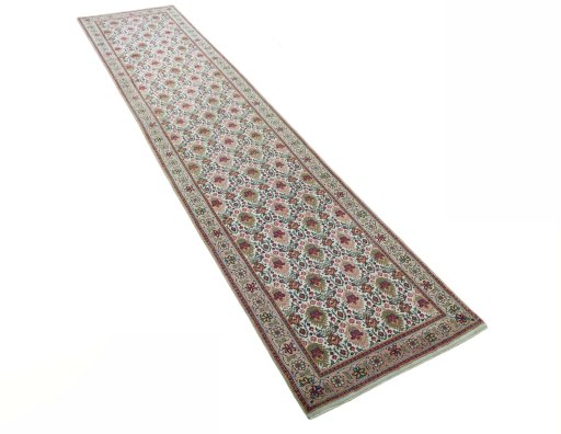 Close-up detail of 2000s Tabriz rug from Iran / Persia showing Wool weave
