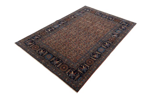 Corner detail of 1930s Tabriz rug showing border pattern and Wool pile