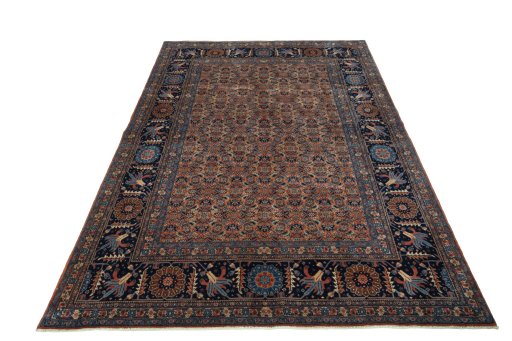 Surface texture of 1930s Tabriz rug with natural Wool and intricate pattern