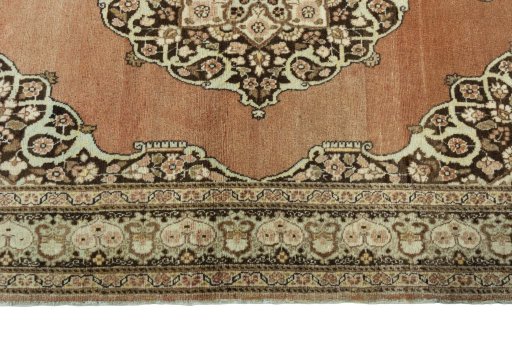 Corner detail of 1930s Tabriz rug showing border pattern and Wool pile