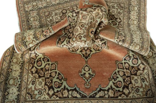 Surface texture of 1930s Tabriz rug with natural Wool and intricate pattern
