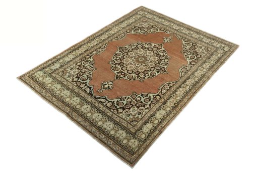 Corner detail of 1930s Tabriz rug showing border pattern and Wool pile