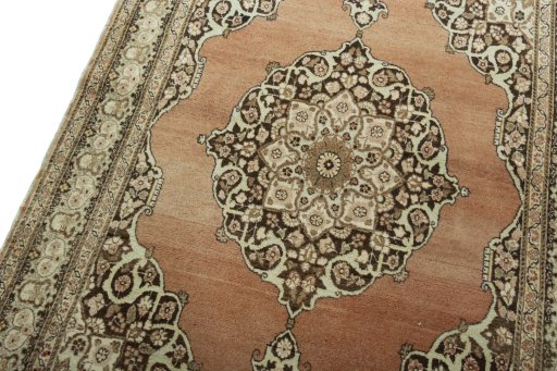 Backside of handmade 1930s Tabriz rug showing knot structure and weave density