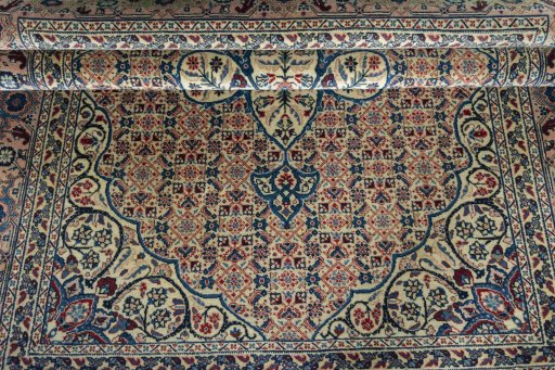 Close-up detail of 1950s Tabriz rug from Iran / Persia showing Wool weave
