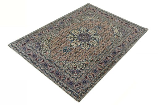 Corner detail of 1950s Tabriz rug showing border pattern and Wool pile