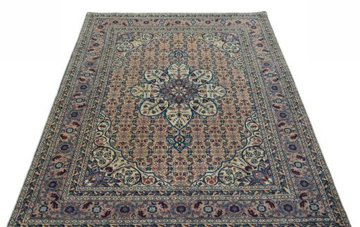 Surface texture of 1950s Tabriz rug with natural Wool and intricate pattern
