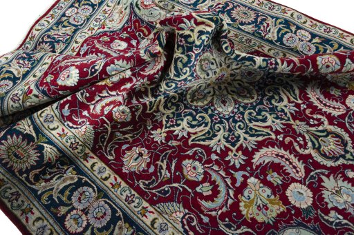 Surface texture of 2000s Tabriz rug with natural Wool and intricate pattern