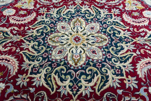 Central medallion detail of 2000s Tabriz rug from Iran / Persia