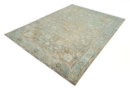Corner detail of 1950s Tabriz rug showing border pattern and Wool pile